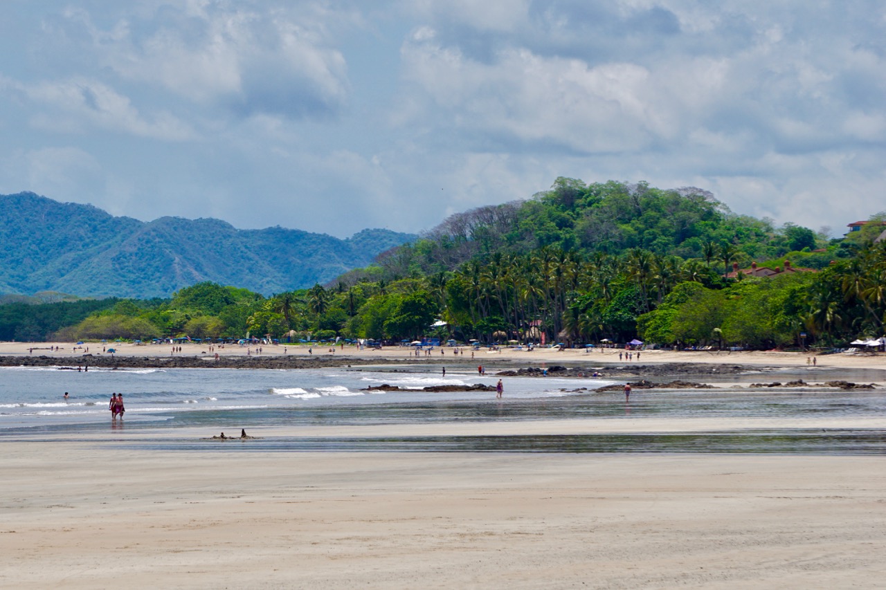 looking down the beach in tamarindo costa rica